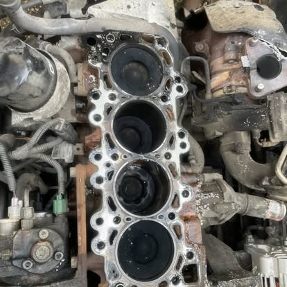 Cylinder head removed from an engine during a repair job